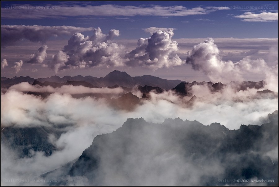 Mountain peaks above the clouds