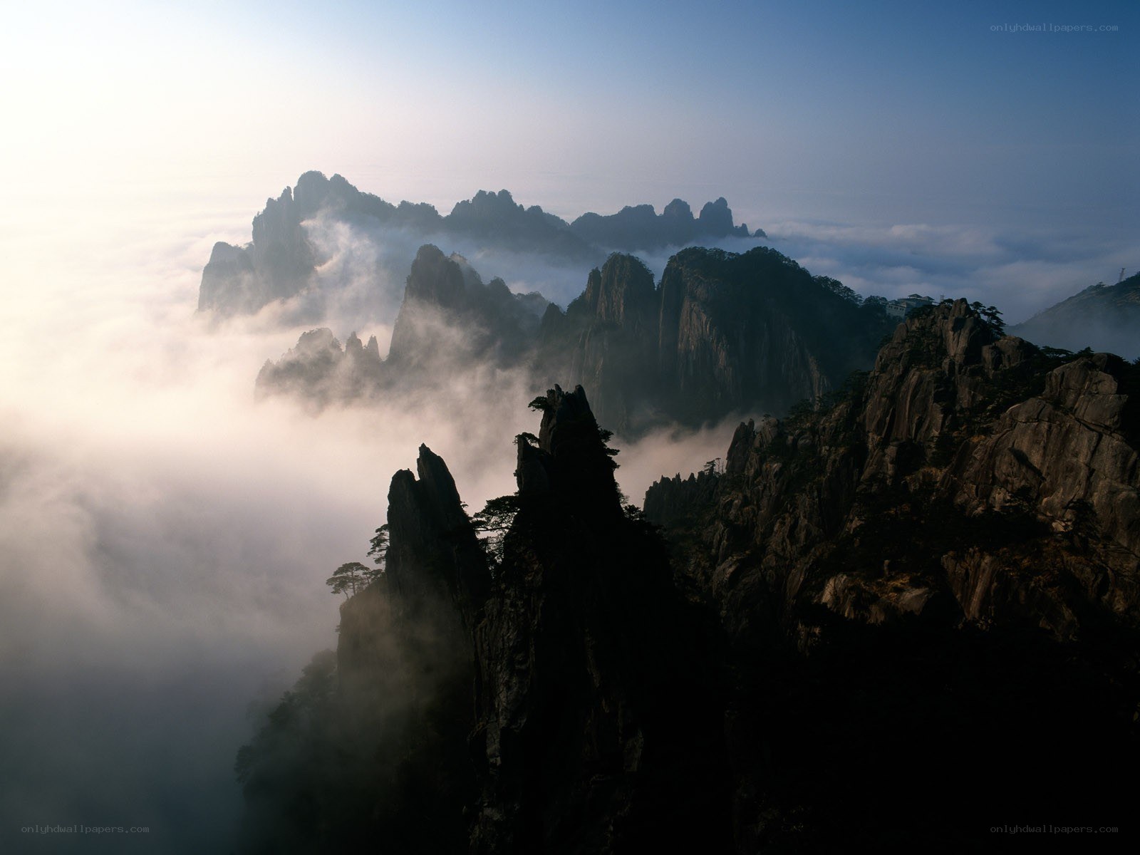 Mountain peaks above the clouds