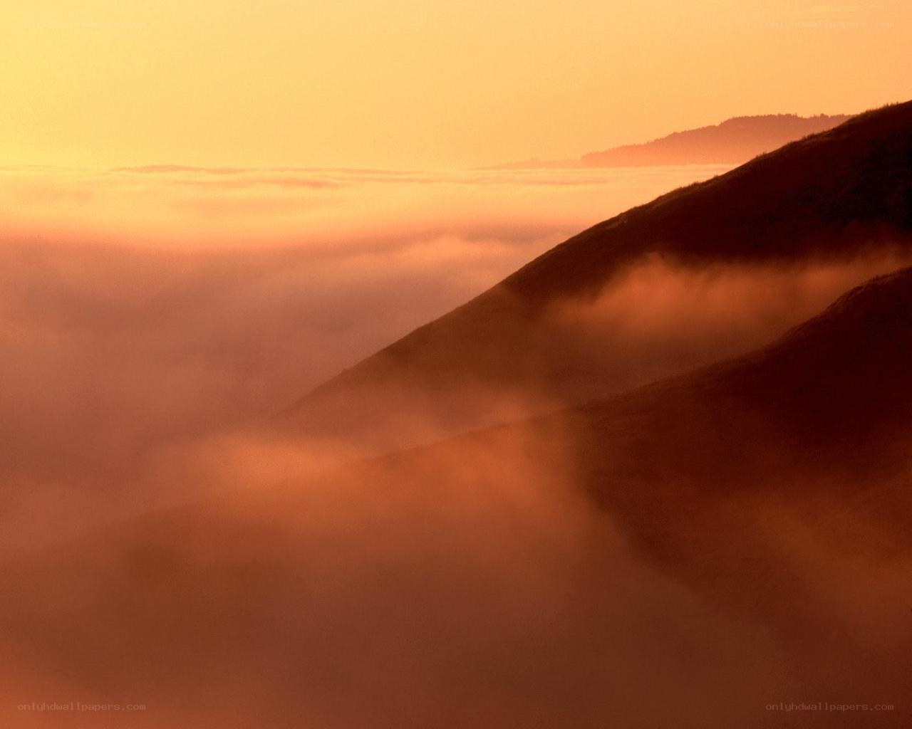 Mountain peaks above the clouds
