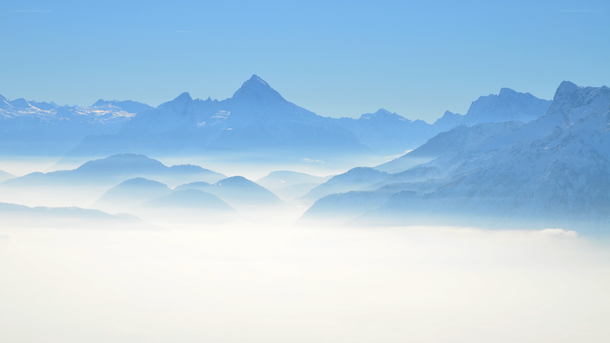 Mountain peaks above the clouds