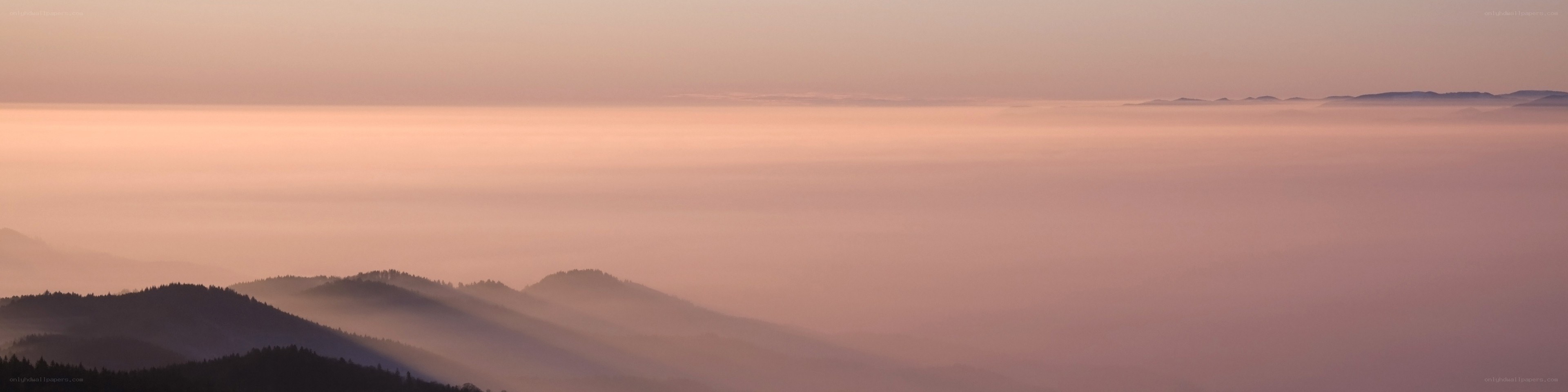 Mountain peaks above the clouds