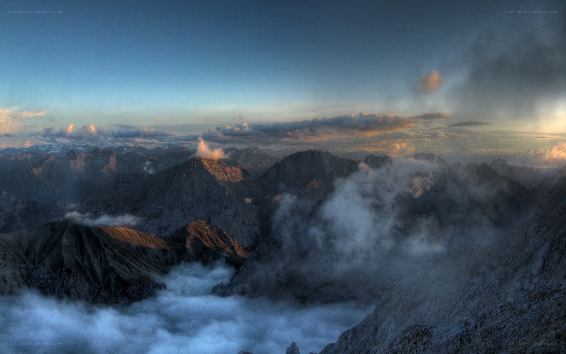 Mountain peaks above the clouds