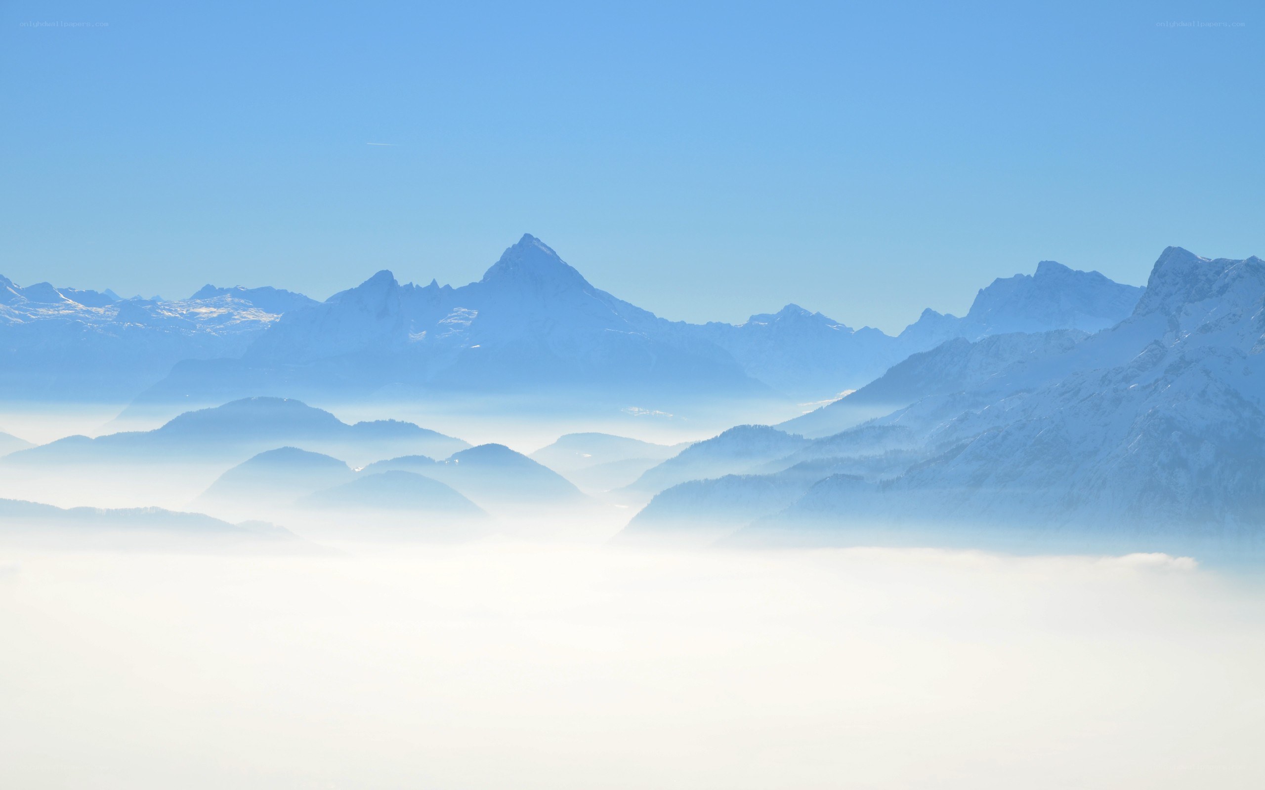 Mountain peaks above the clouds