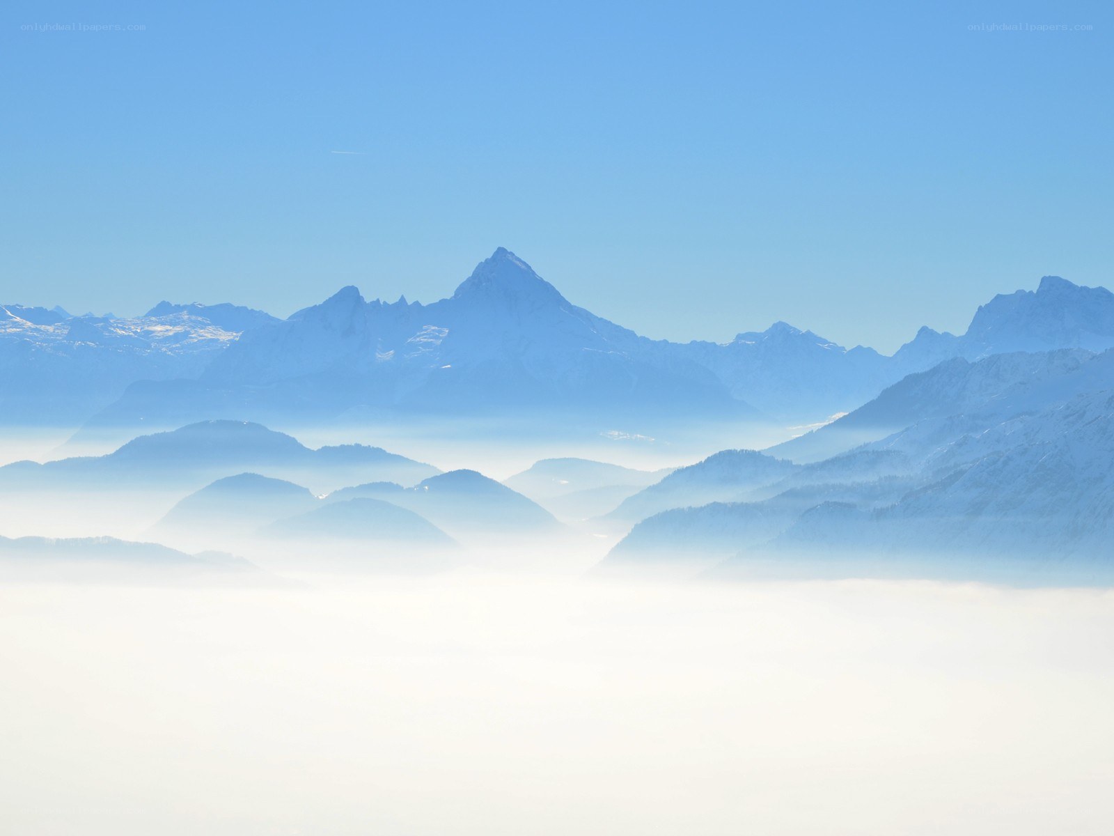Mountain peaks above the clouds