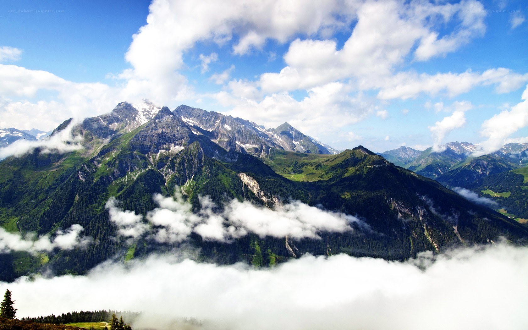 Mountain peaks above the clouds
