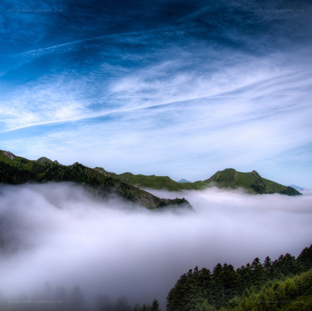 Mountain peaks above the clouds