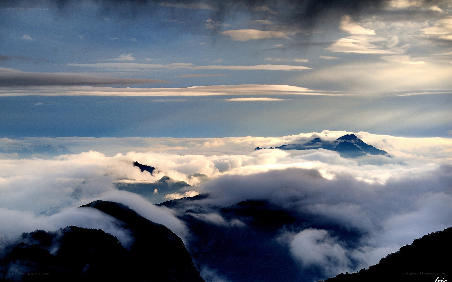 Mountain peaks above the clouds