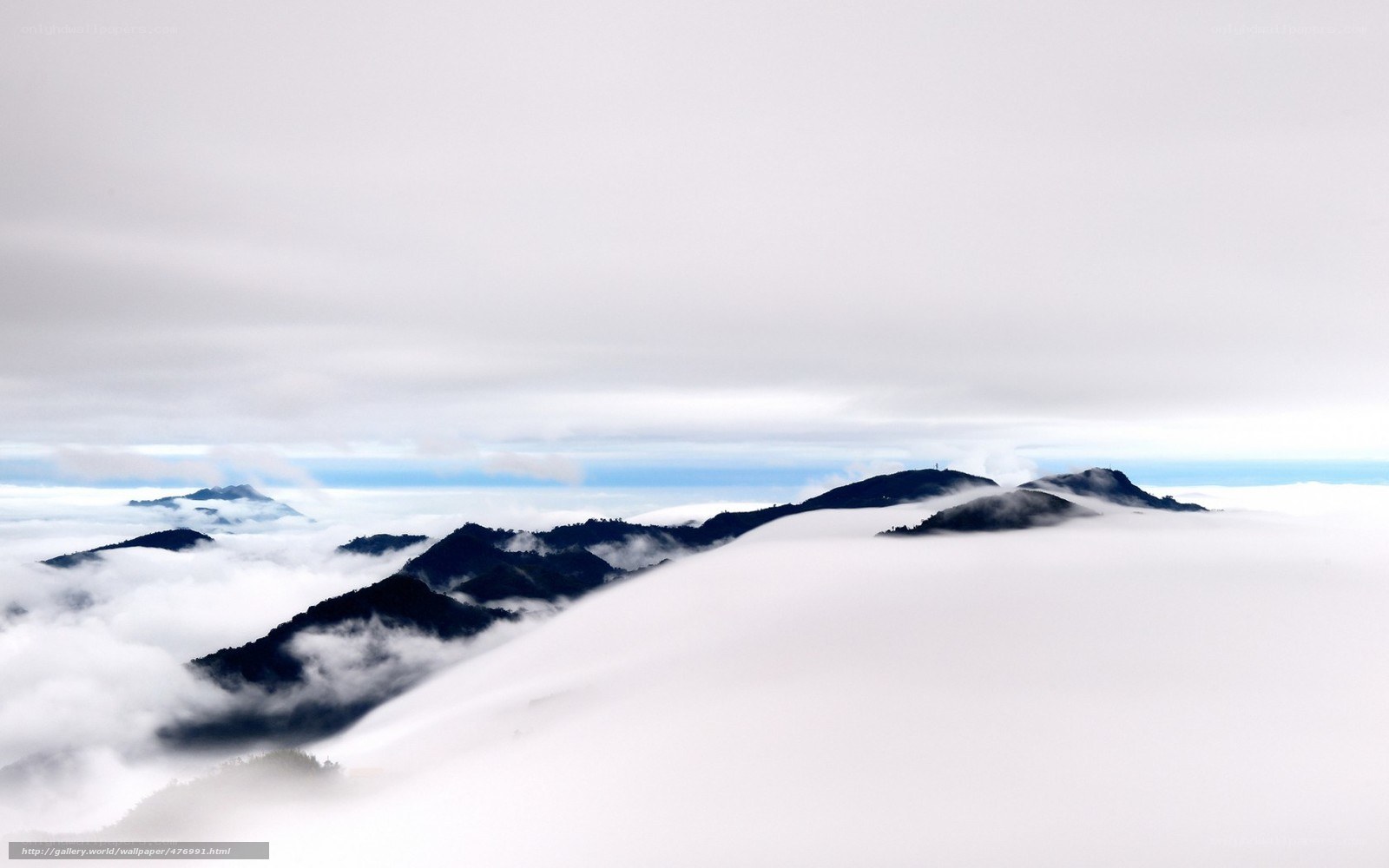 Mountain peaks above the clouds