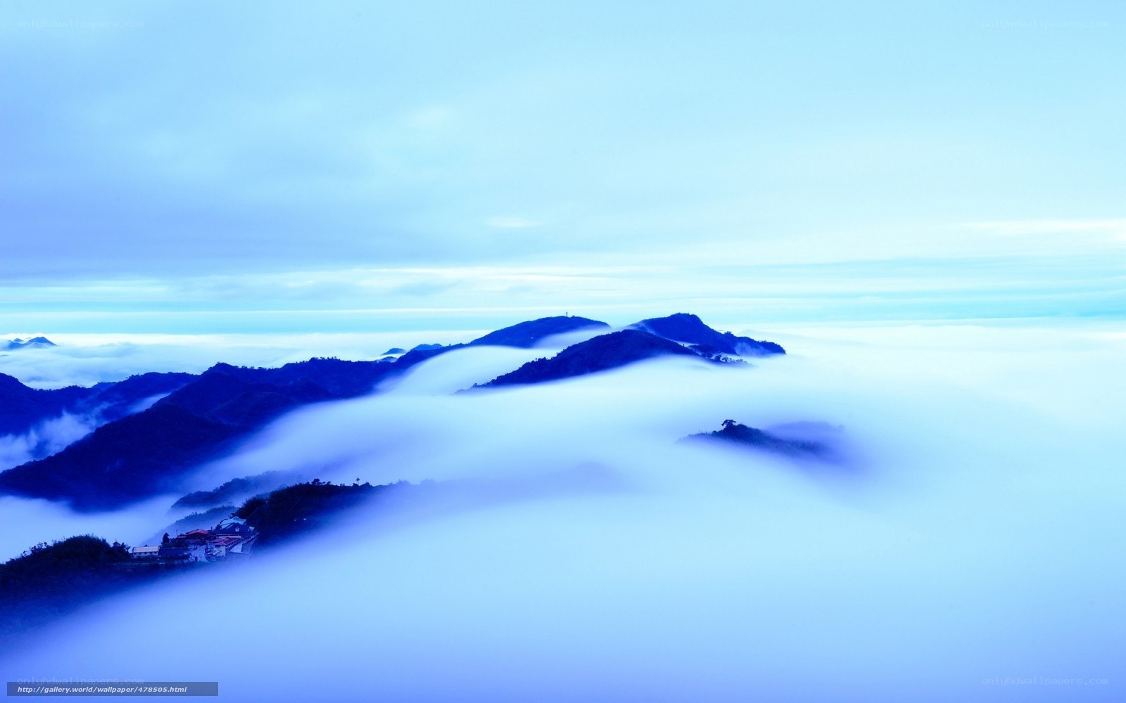 Mountain peaks above the clouds
