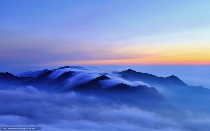 Mountain peaks above the clouds