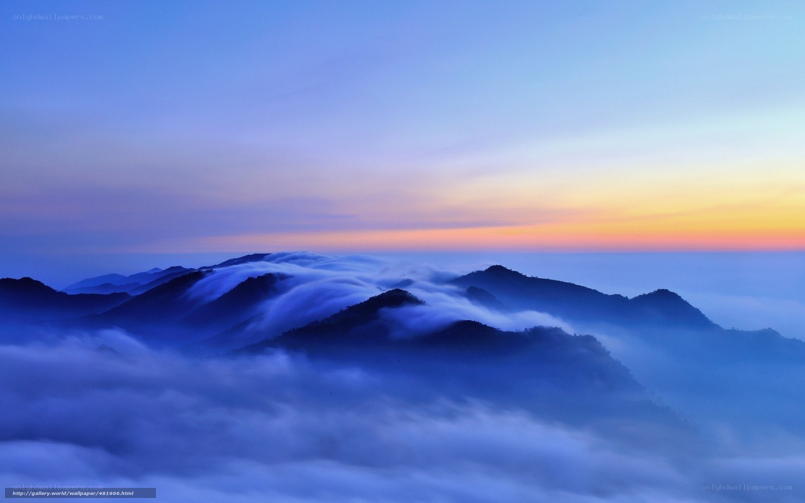 Mountain peaks above the clouds