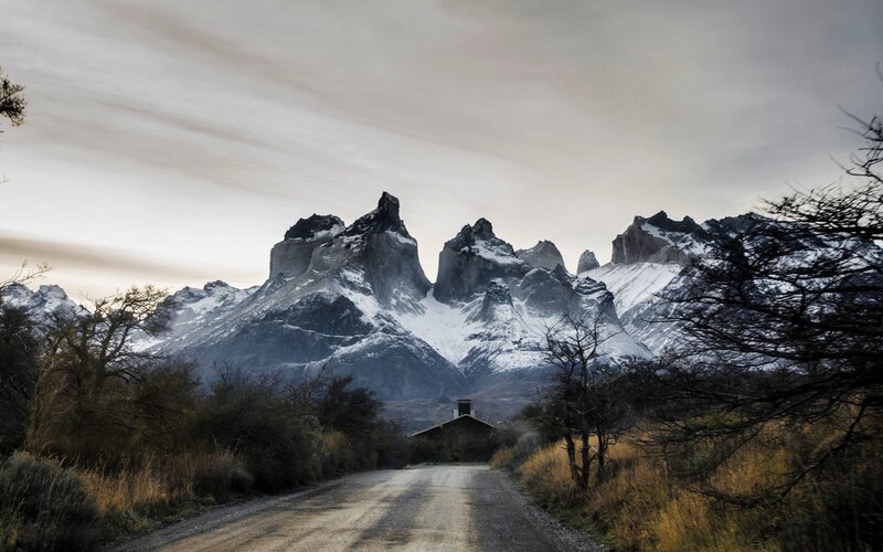 Mountain Peaks and Dirt Road
