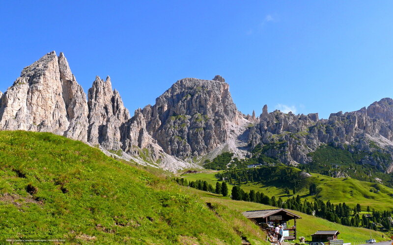 Mountain peaks and green hills