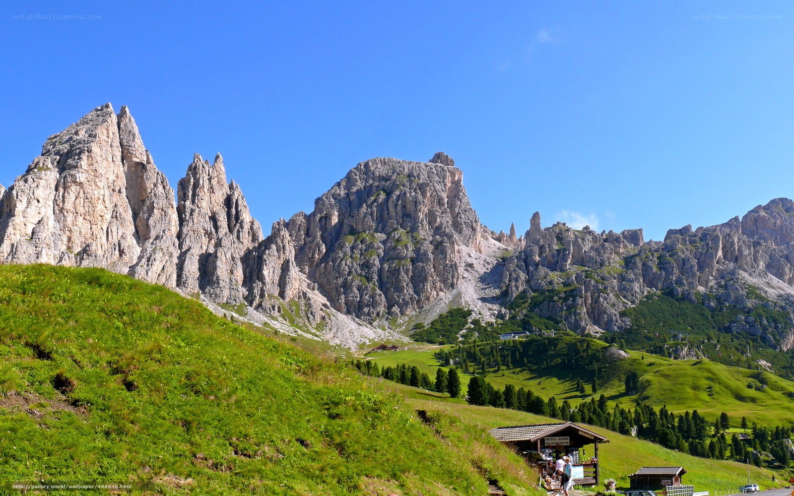 Mountain peaks and green hills
