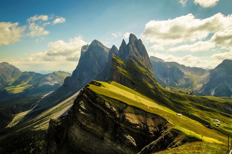 Mountain Peaks and Green Slopes