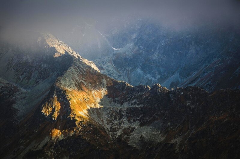 Mountain Peaks at Sunrise — Gray, Dramatic