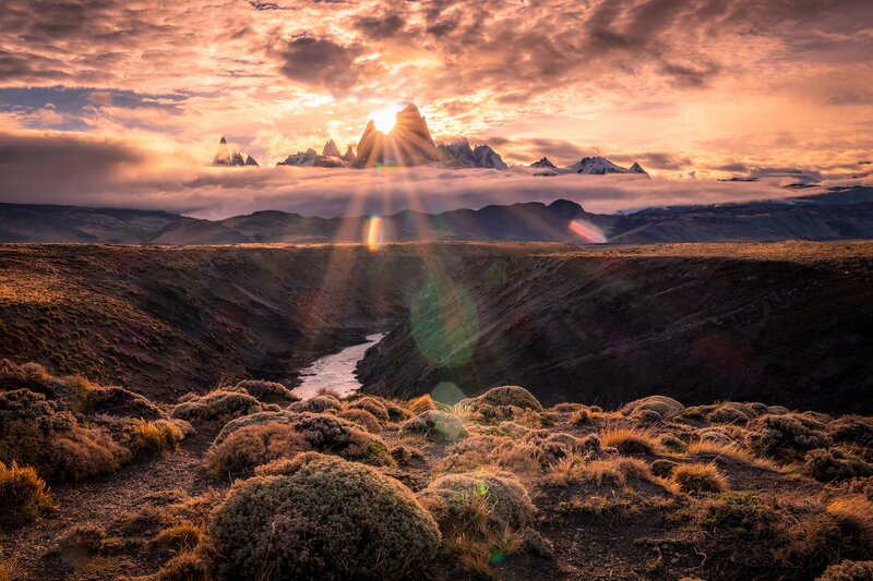 Mountain Peaks at Sunrise — Orange, Dramatic, Photograph, Clouds, River