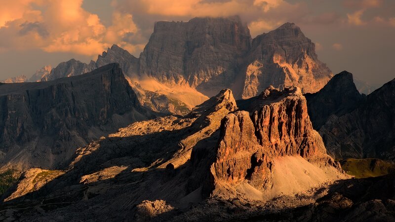 Mountain Peaks at Sunset — Orange, Dramatic, Photograph, Clouds, Rock Formations