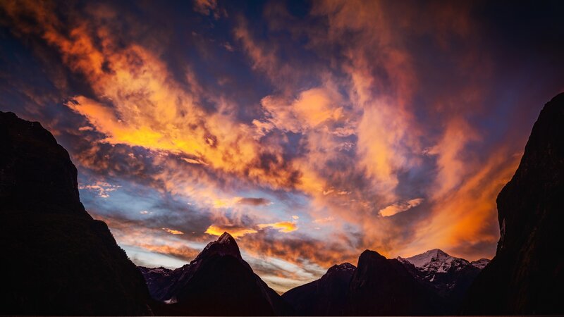 Mountain Peaks at Sunset — Orange, Dramatic, Photograph, Clouds, Sky, Snow
