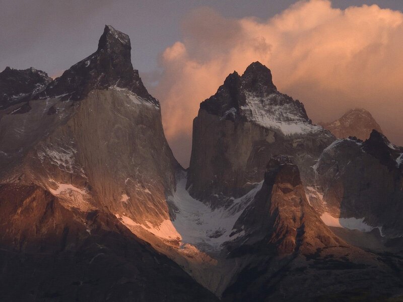 Mountain Peaks at Sunset — Orange, Dramatic, Photograph, Clouds, Snow, Rock, Gray, Brown