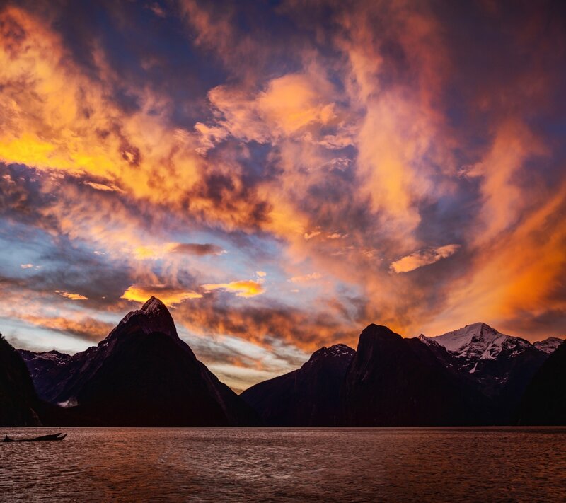 Mountain Peaks at Sunset — Orange, Dramatic, Photograph, Clouds, Water