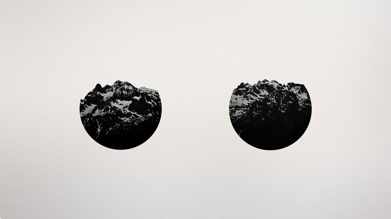 mountain peaks in circular frames