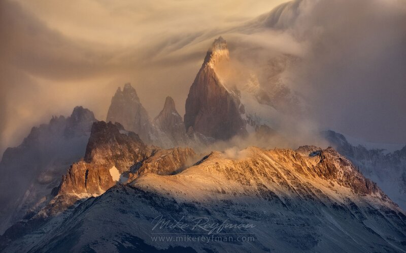 Mountain Peaks in Clouds — Brown