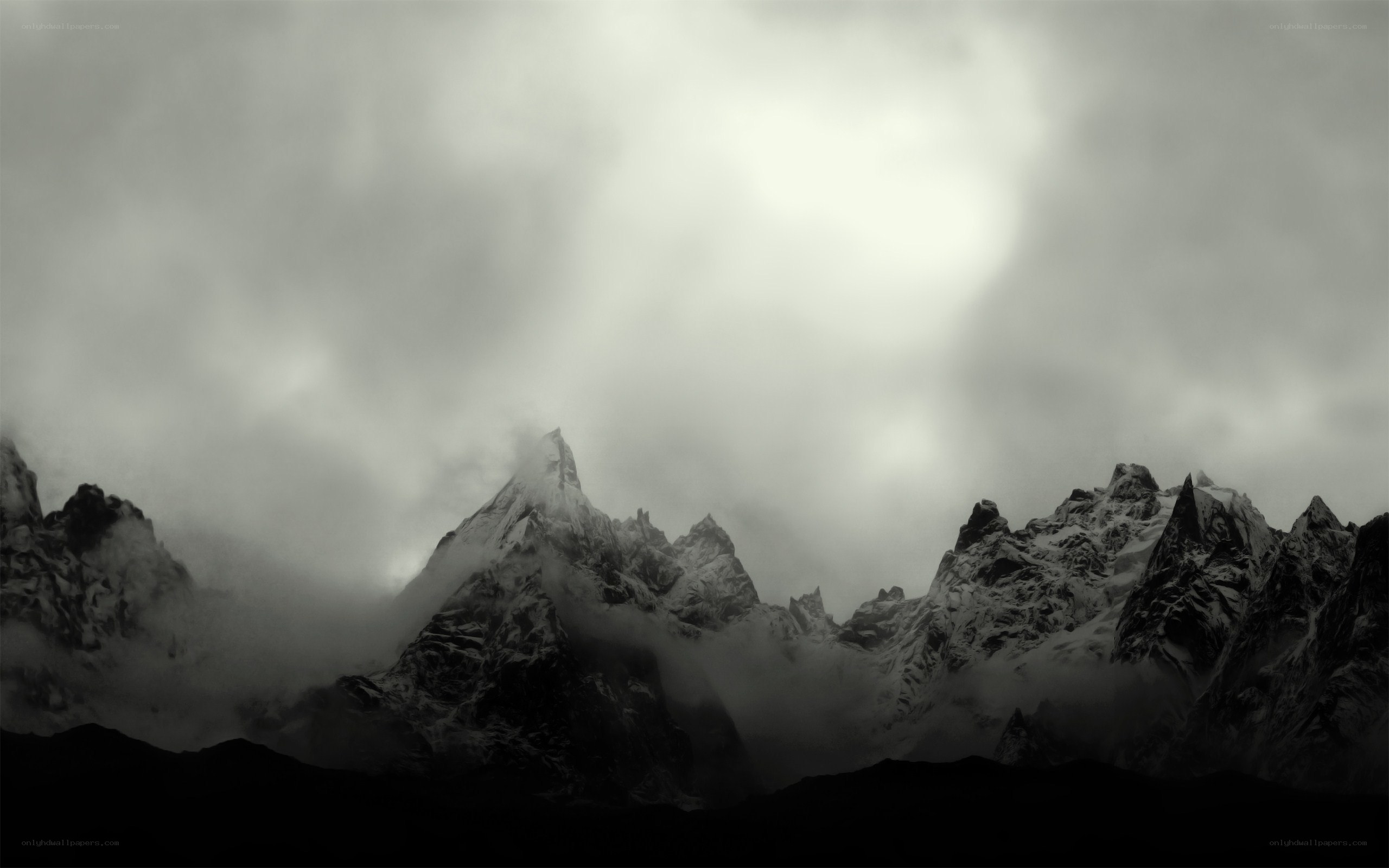 mountain peaks in fog