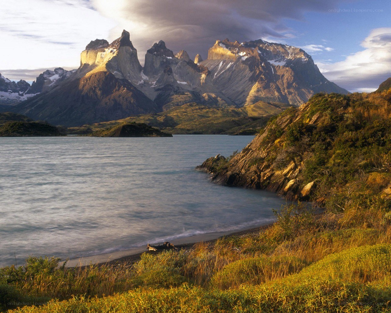mountain peaks over a lake