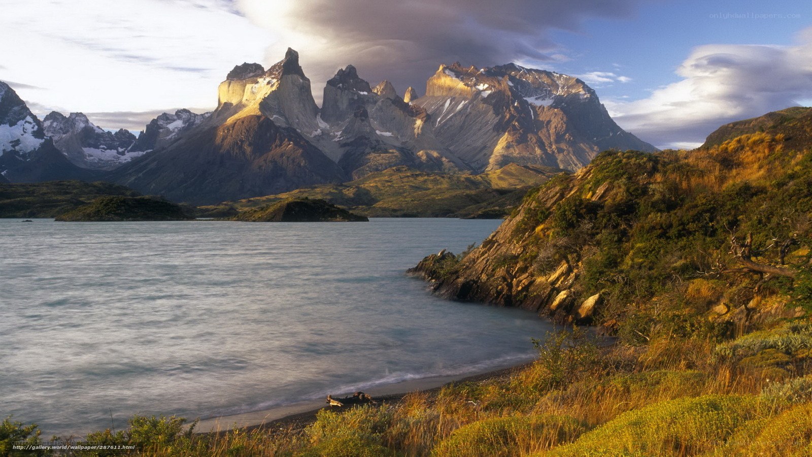 mountain peaks over a lake