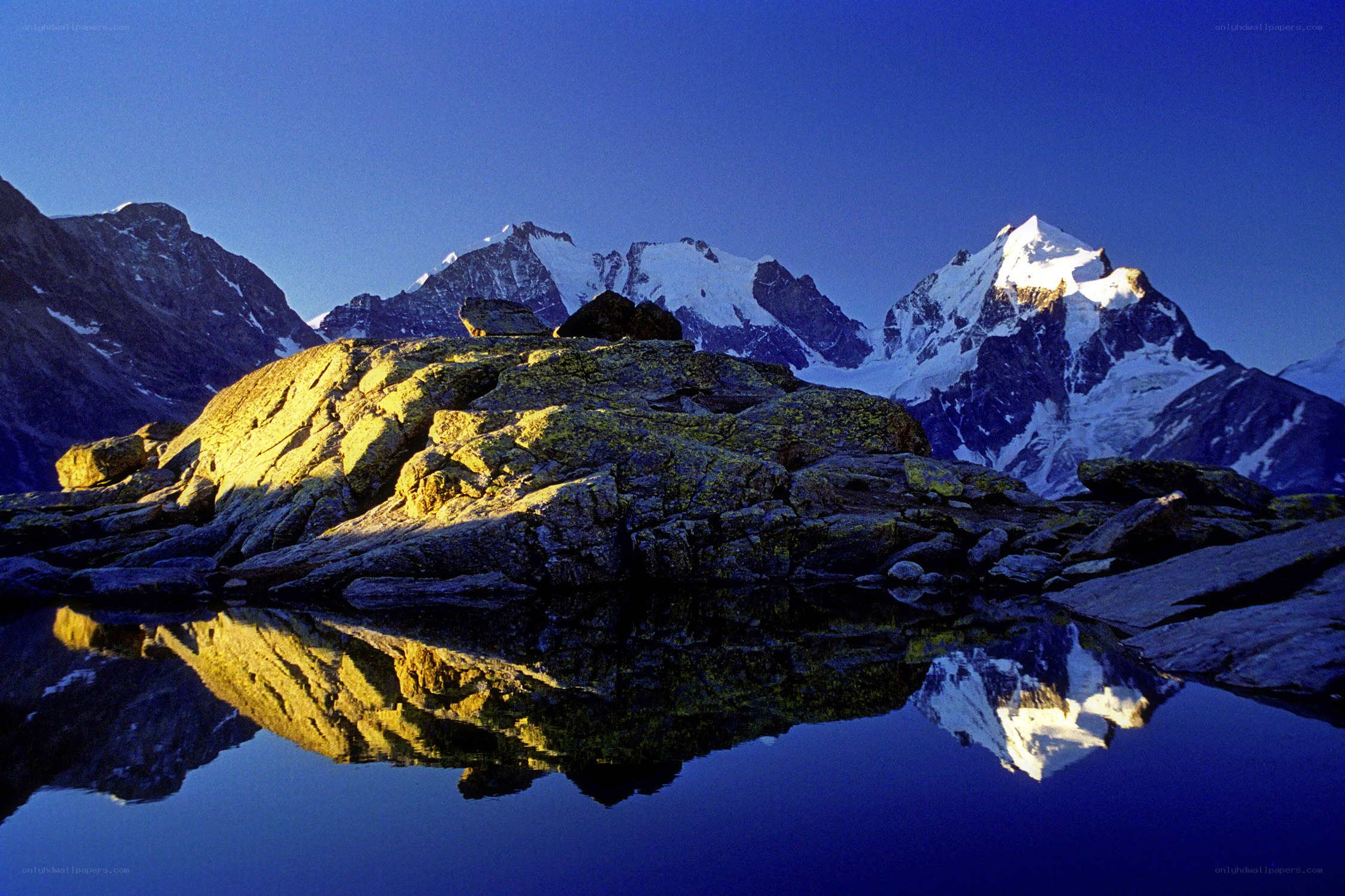Mountain peaks reflected in a lake