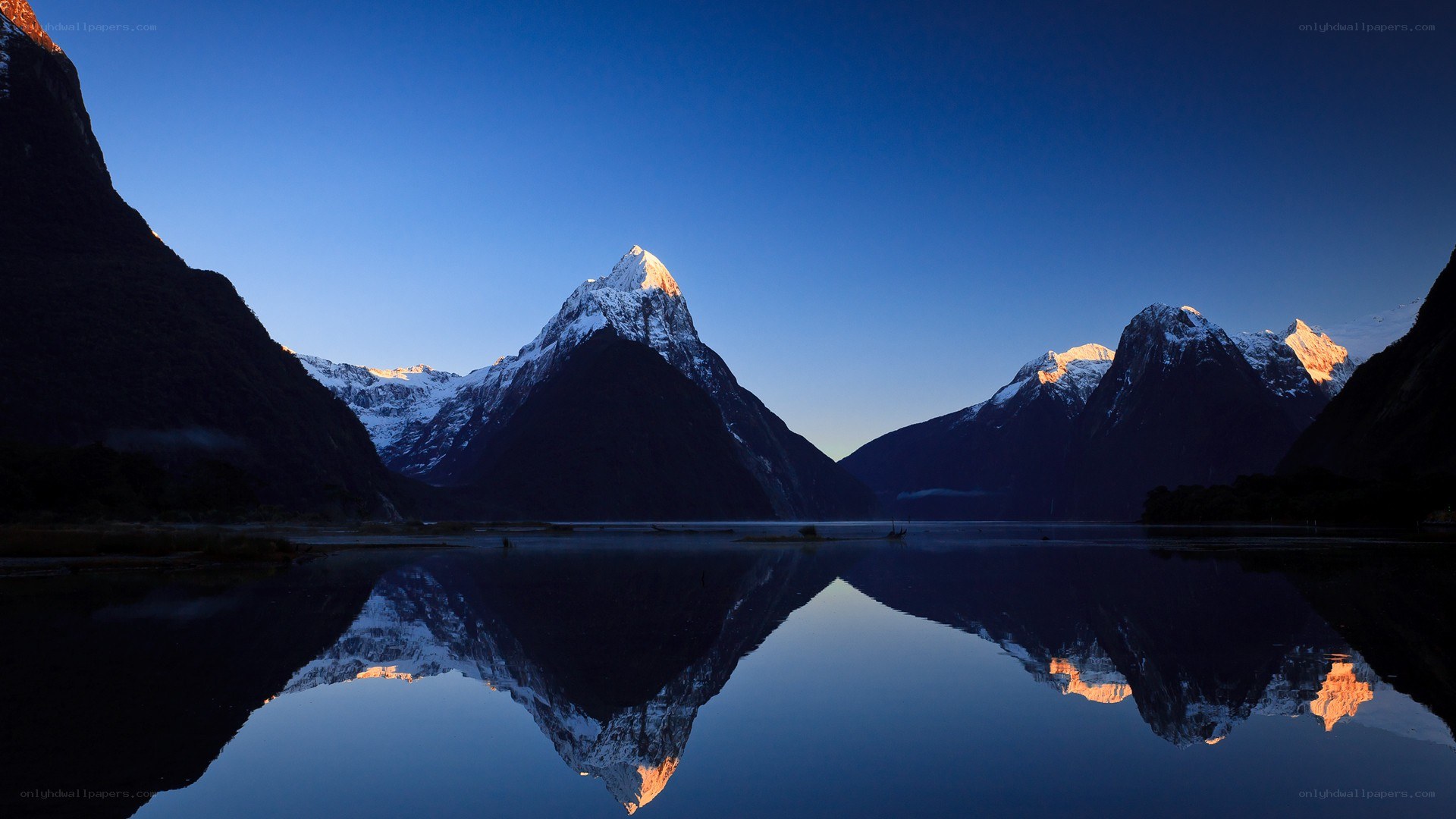 Mountain peaks reflected in a lake