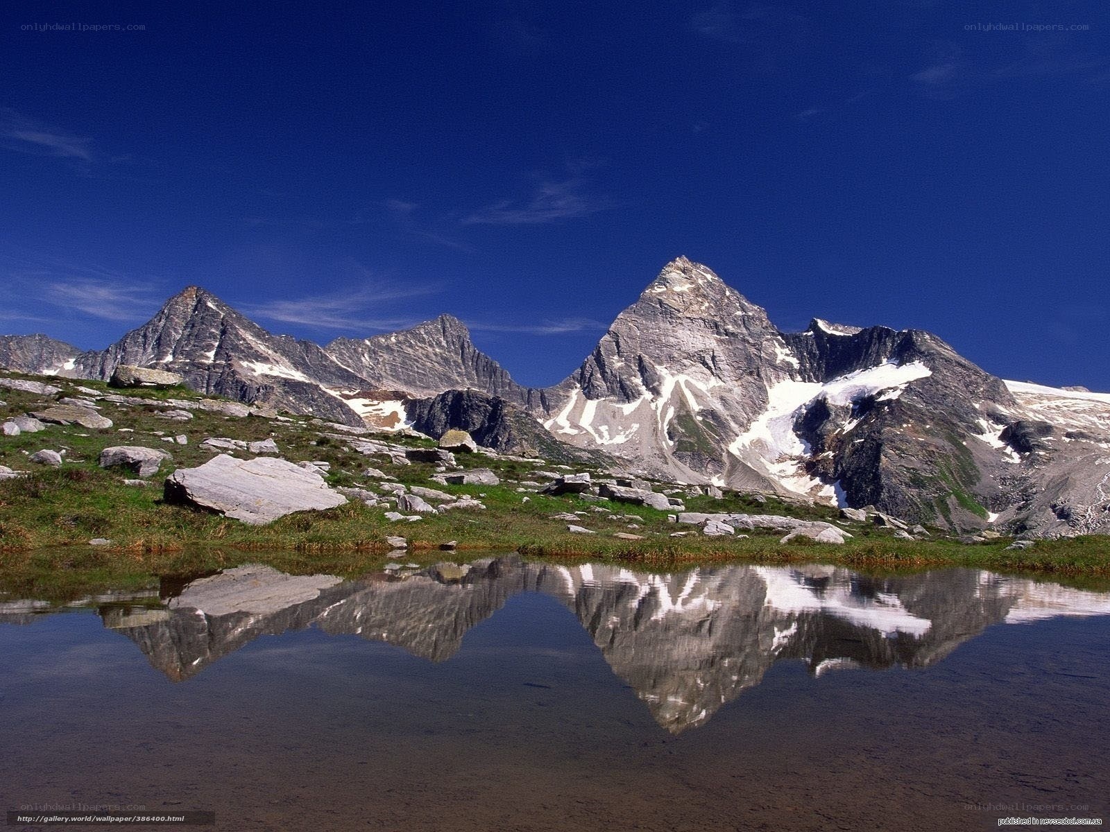 Mountain peaks reflected in a lake