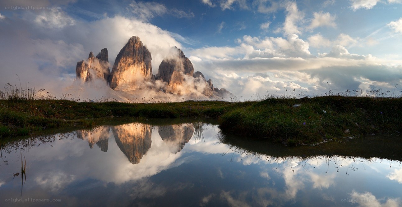 Mountain peaks reflected in a pond