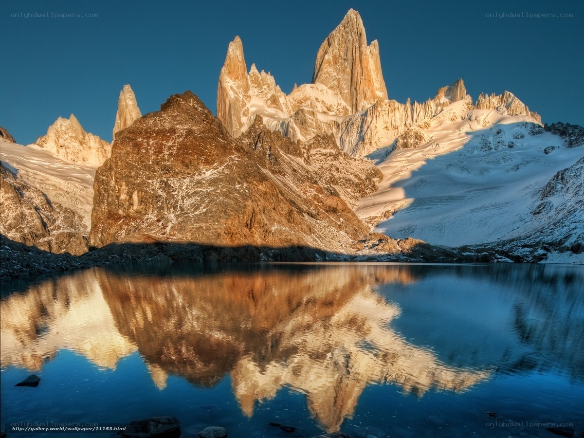 Mountain peaks reflected in lake