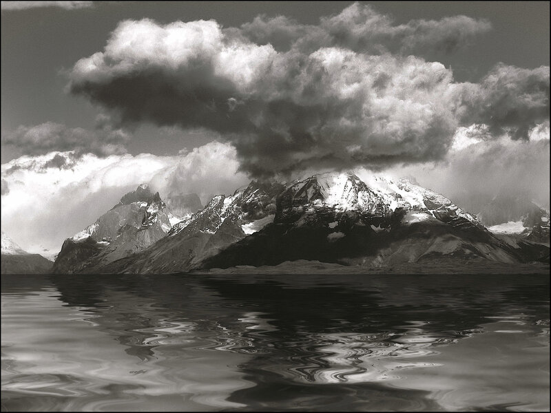 Mountain peaks reflected in water