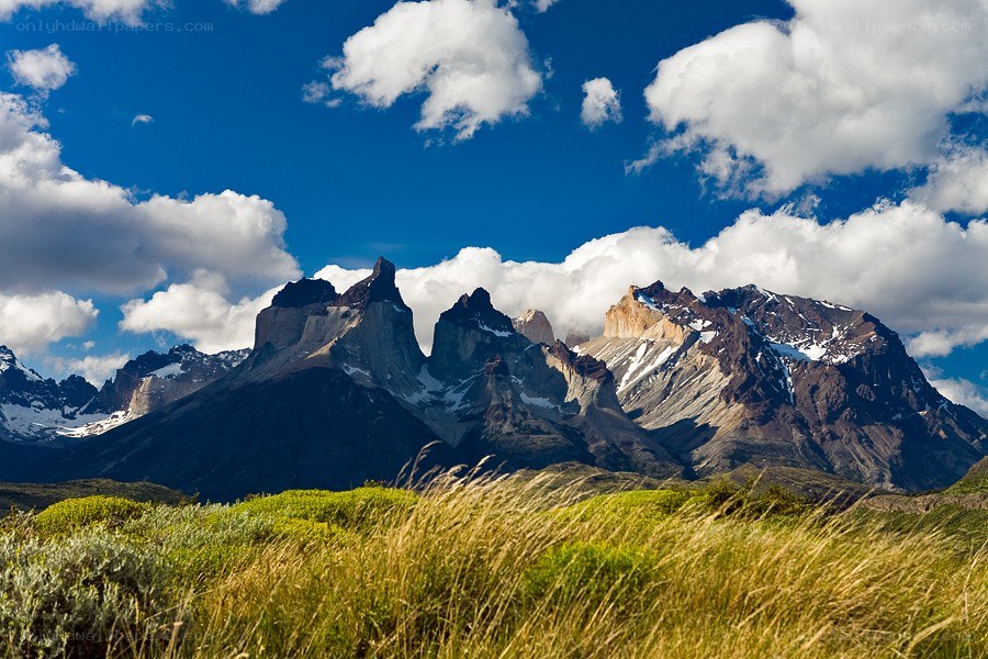 mountain peaks under blue sky