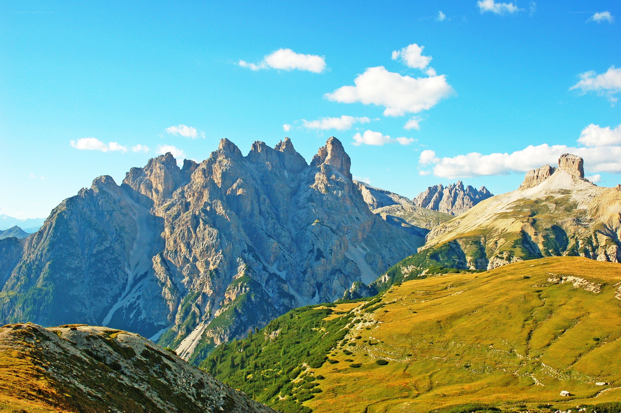 Mountain peaks under blue sky