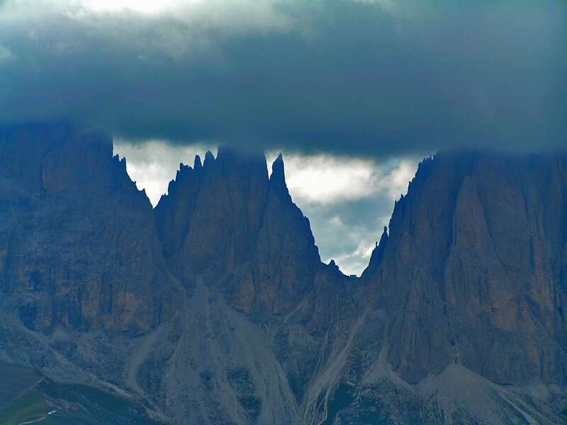 Mountain peaks under storm clouds