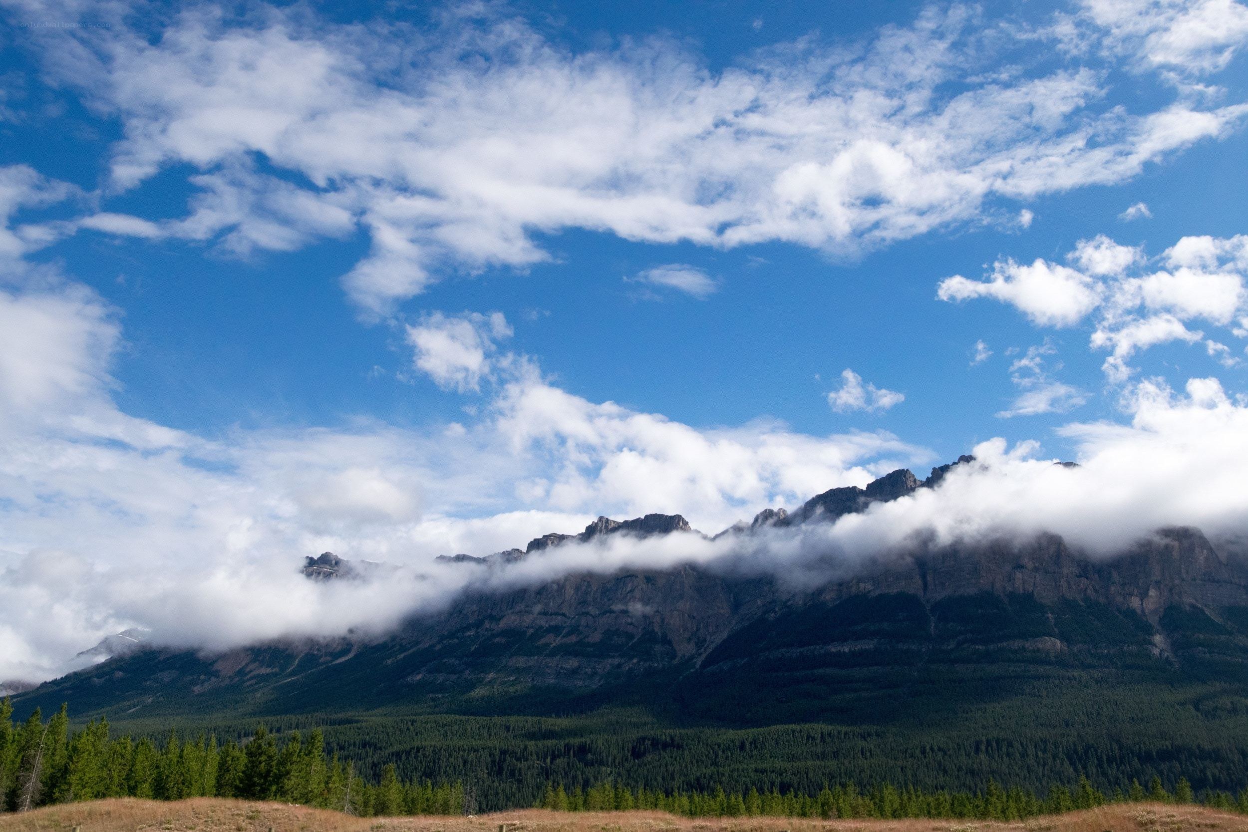 Mountain peaks with clouds