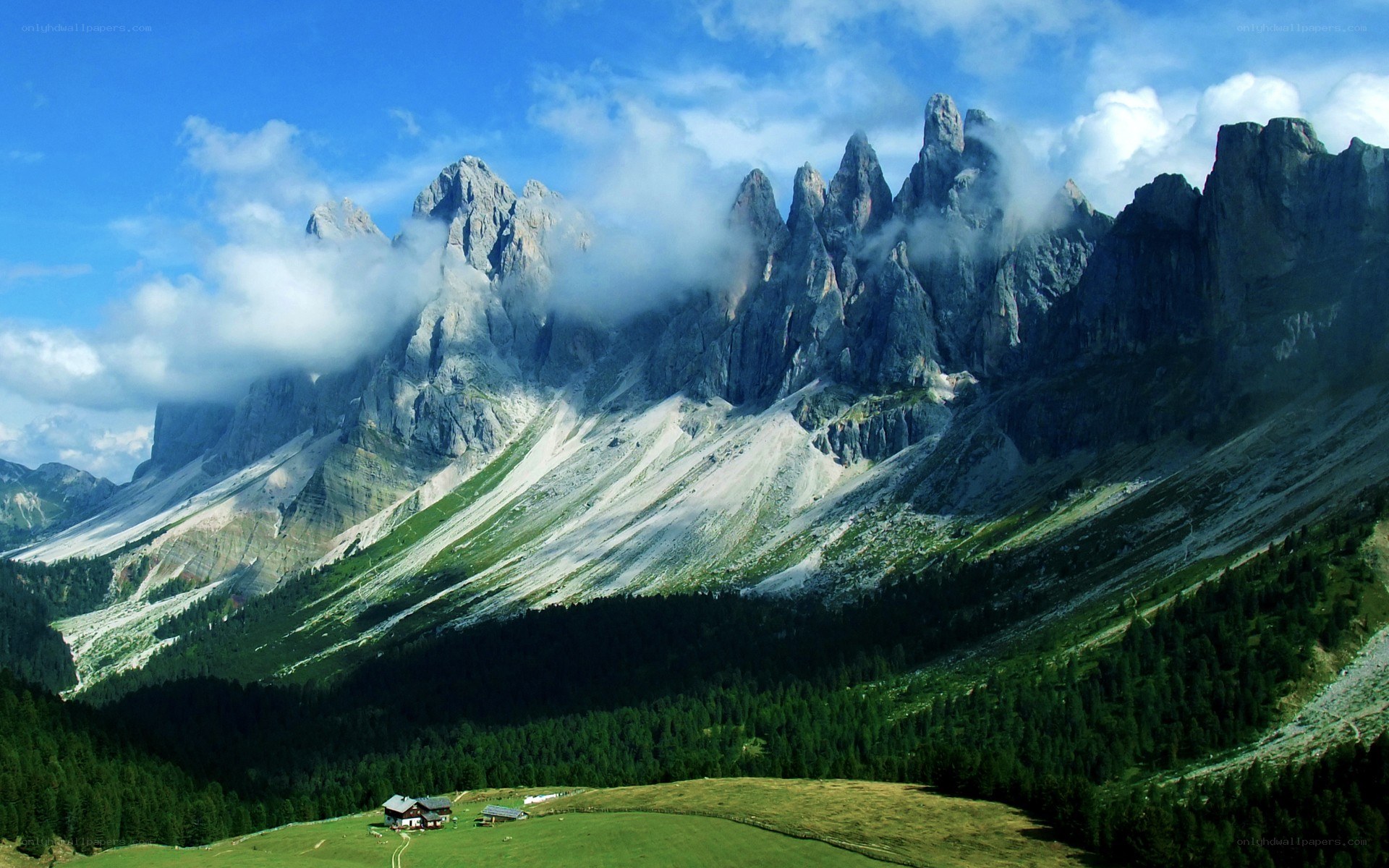 Mountain peaks with clouds and valley