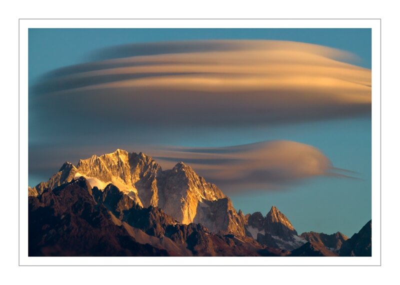 Mountain Peaks with Lenticular Clouds