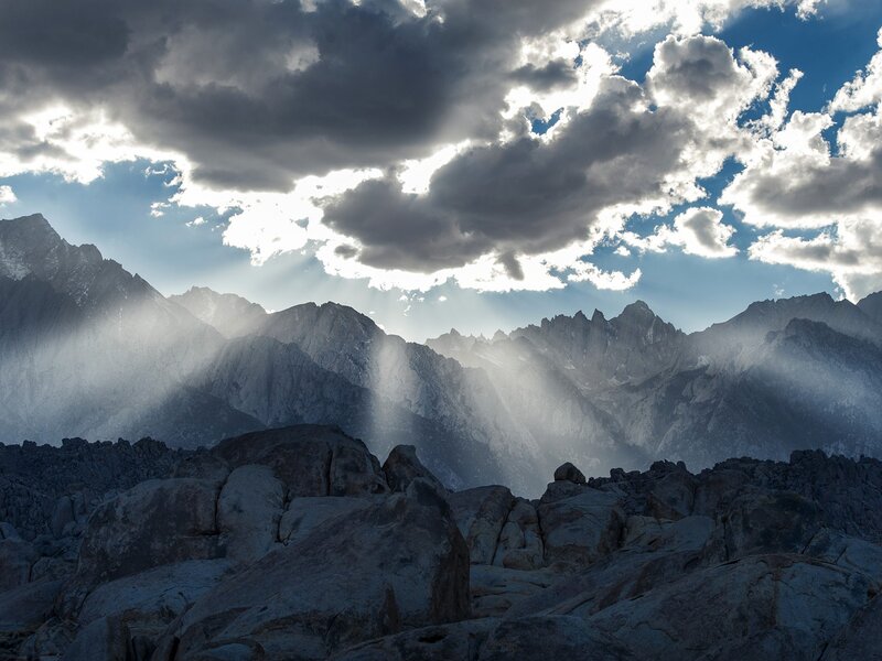 Mountain Peaks with Sunbeams