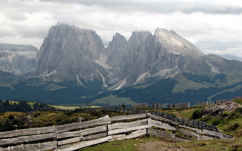 Mountain peaks with wooden fence