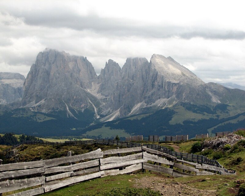 Mountain peaks with wooden fence