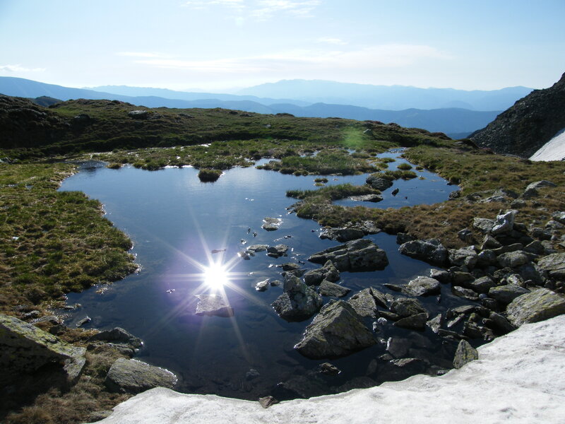 Mountain Pond with Snow