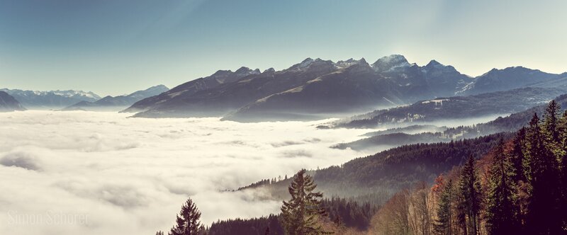 Mountain Range Above Clouds — Blue, Serene, Morning