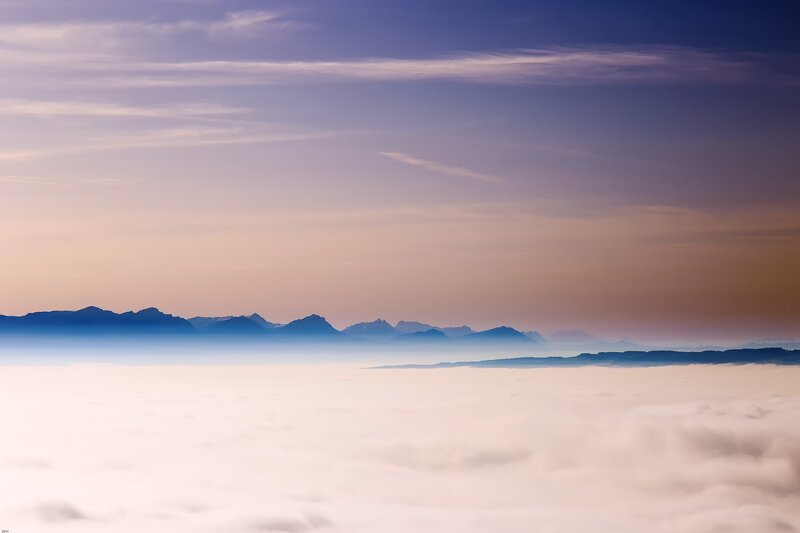 Mountain Range Above Clouds — Blue, Serene, Sunrise