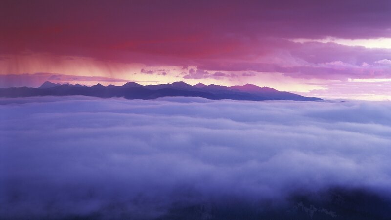 Mountain Range Above Clouds — Purple, Dramatic
