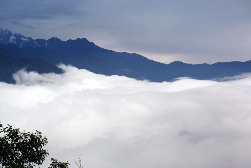 Mountain Range Above Clouds — White, Serene